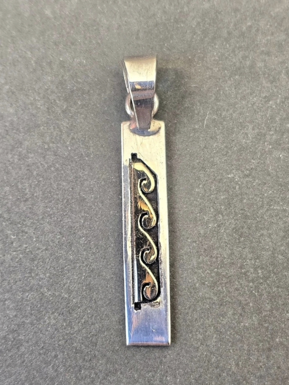 Scott Skeets Navajo Sterling Silver and 14K Gold Overlay Wave Pendant